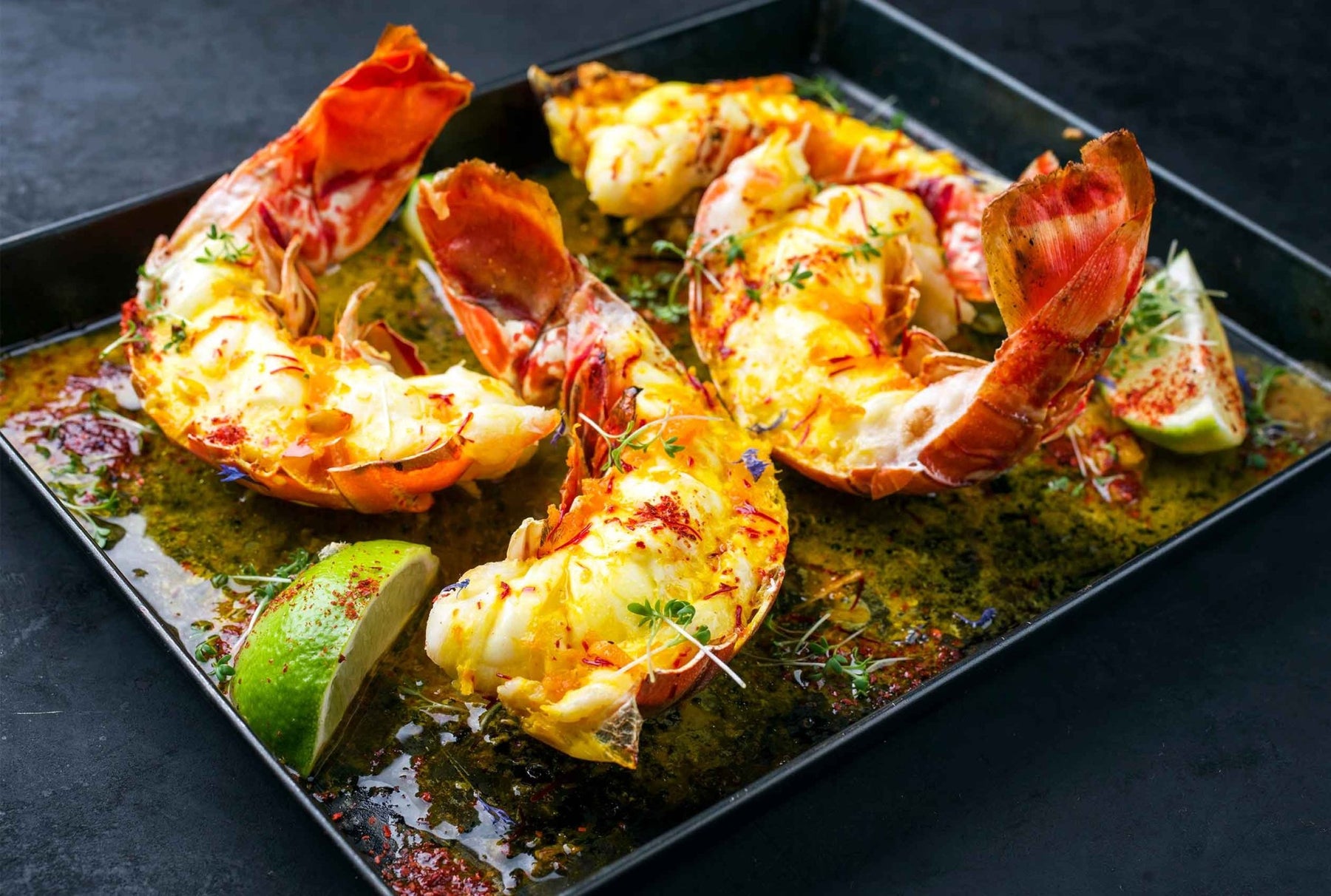 Maine Lobster Tails w/ Cajun Saffron Butter - PrimeFish Seafood Co.